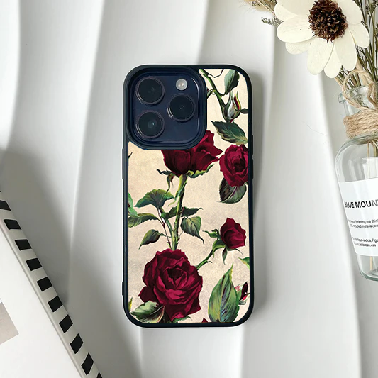 Vintage style phone case with realistic dark red roses and green stems on an antique parchment background.